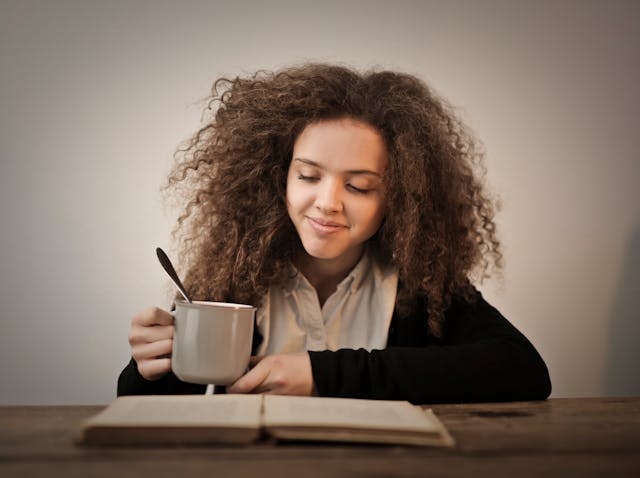 Young%20Person%20Enjoying%20Coffee%20and%20a%20Good%20Book%20